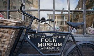 Gloucester Folk Museum sign on an old bicycle