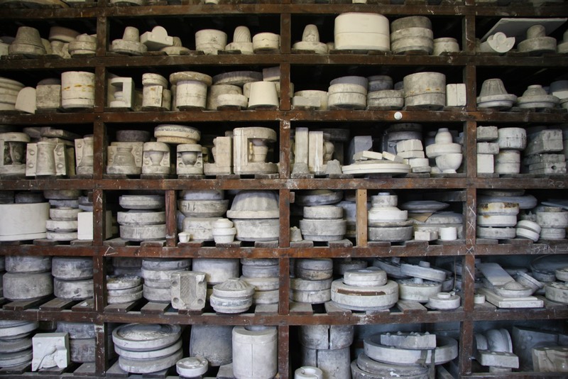 Gladstone pottery, an abundance of ceramic moulds on wooden shelves