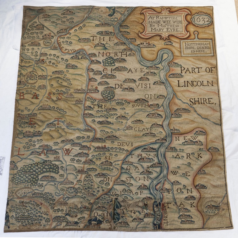 A tapestry map of part of Nottinghamshire. It is dated 1632 at the top right and a cartouche contains the words 'At Rampton made wee were by Mistress Mary Eyre'